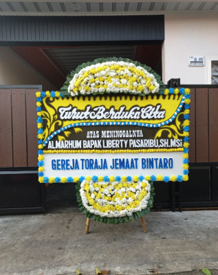 Papan Bunga Duka di Kampung Dalam